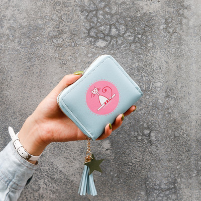 Ādas sieviešu maks ar kulonu un aplikāciju