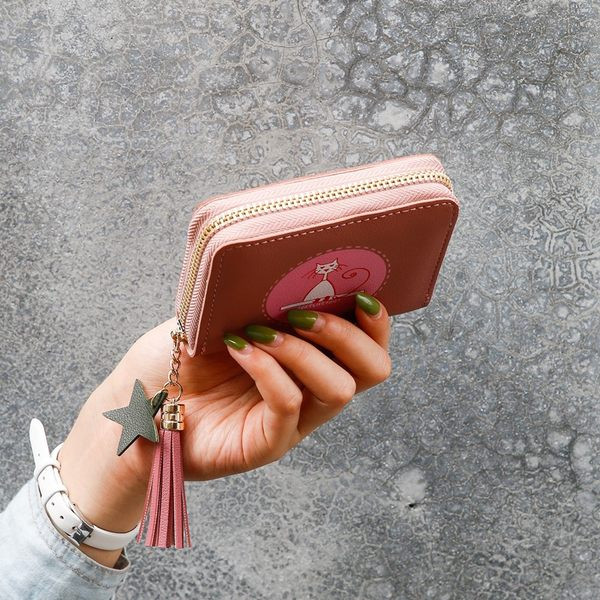 Ādas sieviešu maks ar kulonu un aplikāciju