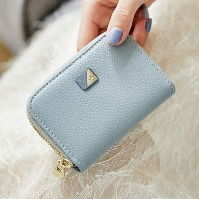 Καθημερινό γυναικείο πορτοφόλι με μεταλλικό στοιχείο και φερμουάρ