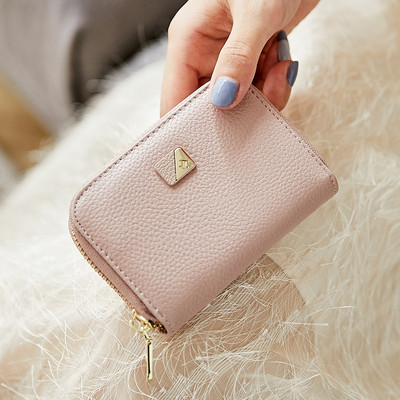 Καθημερινό γυναικείο πορτοφόλι με μεταλλικό στοιχείο και φερμουάρ