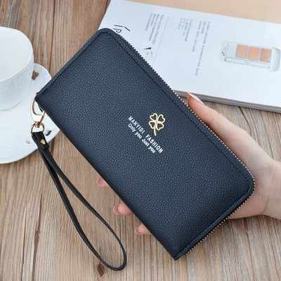 Sieviešu maks no eko ādas ar metāla āboliņu