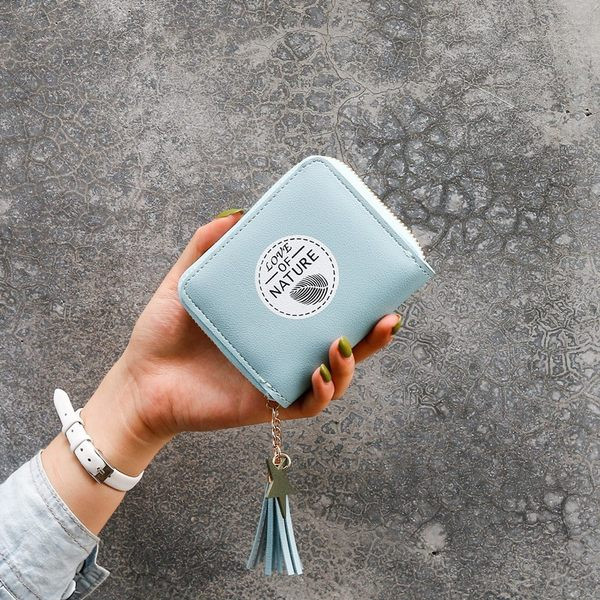 Γυναικείο έκο δερμάτινο πορτοφόλι με φερμουάρ και μενταγιόν