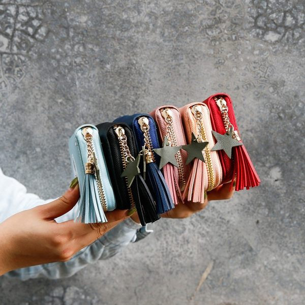 Γυναικείο έκο δερμάτινο πορτοφόλι με φερμουάρ και μενταγιόν