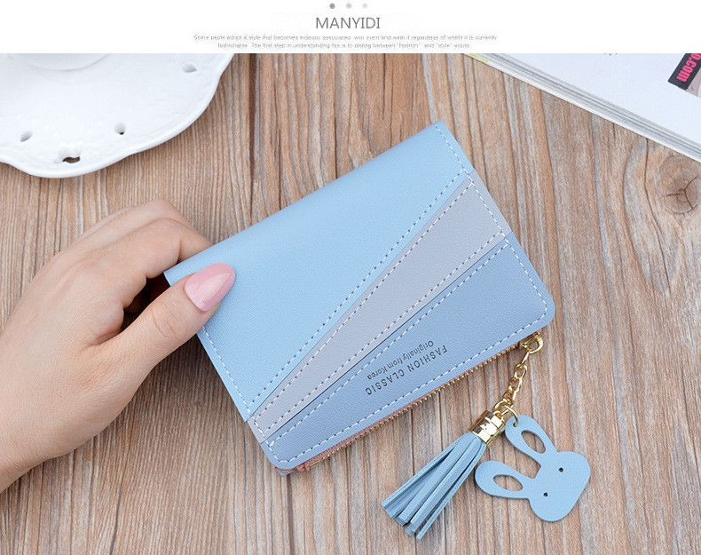 Μικρό έκο δερμάτινο γυναικείο πορτοφόλι  με φερμουάρ και φούντα