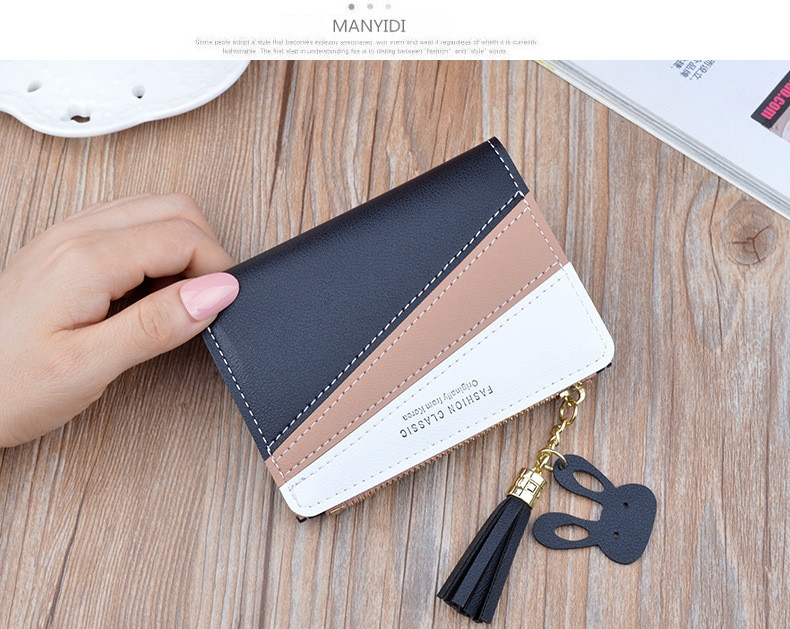 Μικρό έκο δερμάτινο γυναικείο πορτοφόλι  με φερμουάρ και φούντα