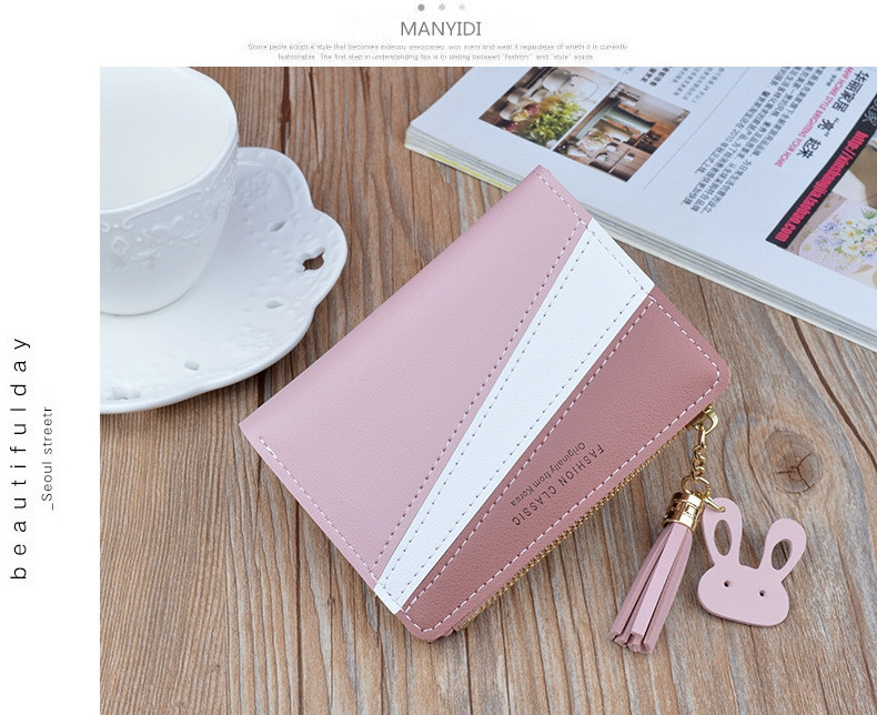 Μικρό έκο δερμάτινο γυναικείο πορτοφόλι  με φερμουάρ και φούντα