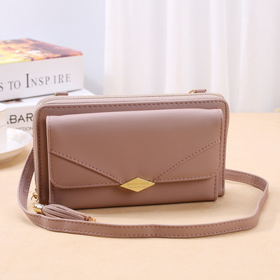 Γυναικείο έκο δερμάτινο πορτοφόλι με φούντα σε διάφορα χρώματα