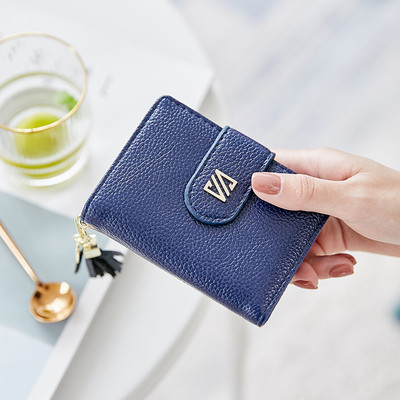 Γυναικείο έκο δερμάτινο πορτοφόλι με μεταλλικό κούμπωμα και αξεσουάρ