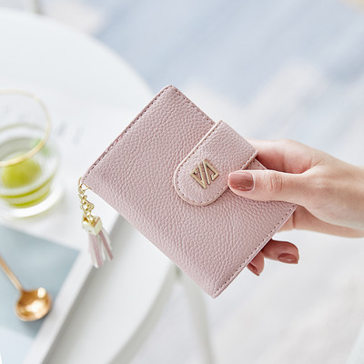 Γυναικείο έκο δερμάτινο πορτοφόλι με μεταλλικό κούμπωμα και αξεσουάρ