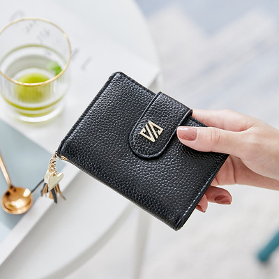 Γυναικείο έκο δερμάτινο πορτοφόλι με μεταλλικό κούμπωμα και αξεσουάρ