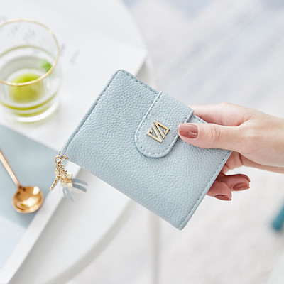 Γυναικείο έκο δερμάτινο πορτοφόλι με μεταλλικό κούμπωμα και αξεσουάρ