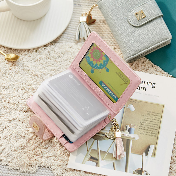 Γυναικείο έκο δερμάτινο πορτοφόλι με μεταλλικό κούμπωμα και αξεσουάρ