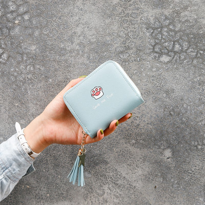 Sieviešu ādas somiņa ar aplikāciju un rāvējslēdzēju