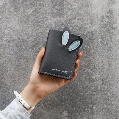 Γυναικείο πορτοφόλι από οικολογικό δέρμα με τρισδιάστατα στοιχεία