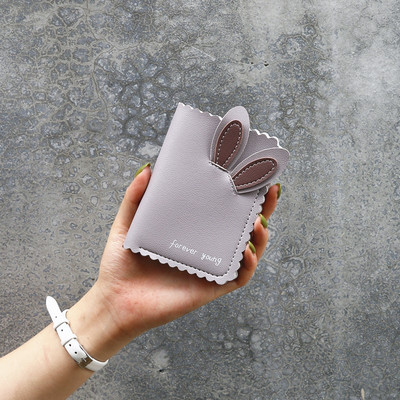 Γυναικείο πορτοφόλι από οικολογικό δέρμα με τρισδιάστατα στοιχεία