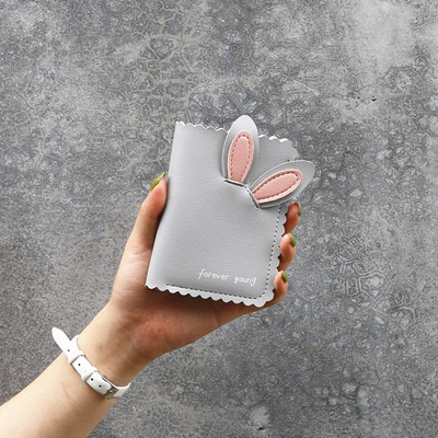 Γυναικείο πορτοφόλι από οικολογικό δέρμα με τρισδιάστατα στοιχεία