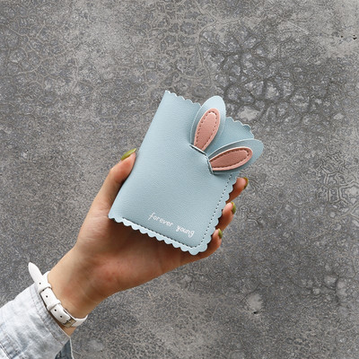 Γυναικείο πορτοφόλι από οικολογικό δέρμα με τρισδιάστατα στοιχεία