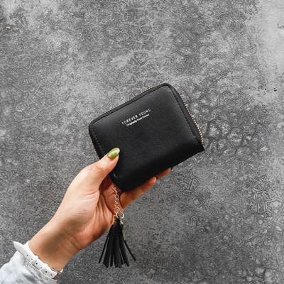 Γυναικείο μικρό πορτοφόλι από οικολογικό δέρμα με φερμουάρ και επιγραφή