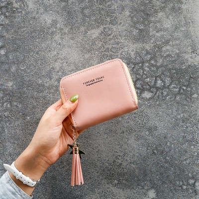 Γυναικείο μικρό πορτοφόλι από οικολογικό δέρμα με φερμουάρ και επιγραφή