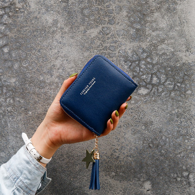 Γυναικείο μικρό πορτοφόλι από οικολογικό δέρμα με φερμουάρ και επιγραφή