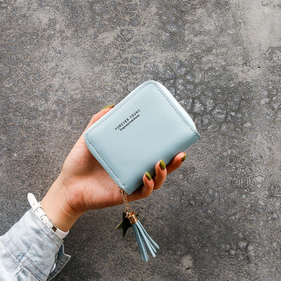 Γυναικείο μικρό πορτοφόλι από οικολογικό δέρμα με φερμουάρ και επιγραφή