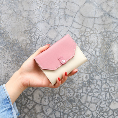 Γυναικείο πορτοφόλι από οικολογικό δέρμα με μεταλλική στερέωση