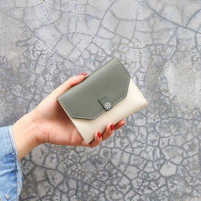 Γυναικείο πορτοφόλι από οικολογικό δέρμα με μεταλλική στερέωση