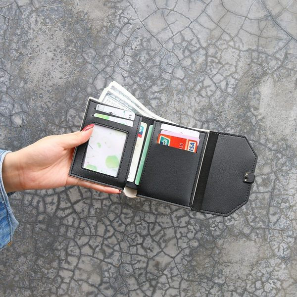 Γυναικείο πορτοφόλι από οικολογικό δέρμα με μεταλλική στερέωση