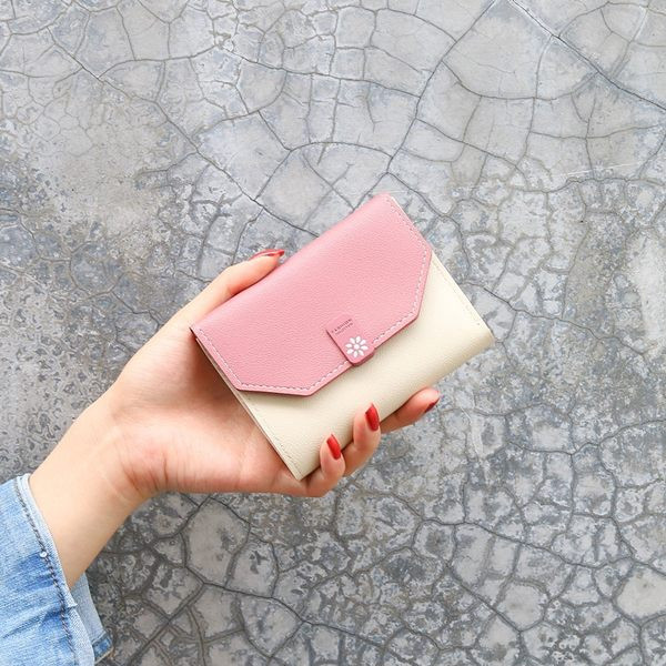 Γυναικείο πορτοφόλι από οικολογικό δέρμα με μεταλλική στερέωση