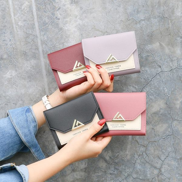 Γυναικείο έκο δερμάτινο πορτοφόλι με μεταλλικό κούμπωμα σε διάφορα χρώματα