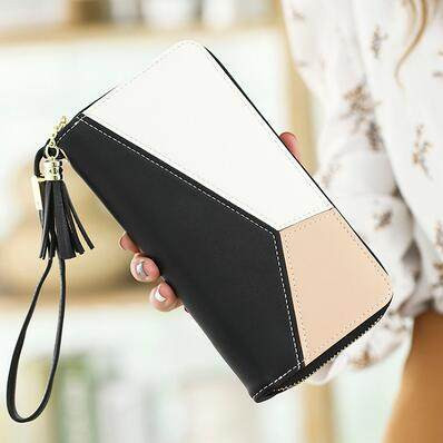 Πολυλειτουργικό γυναικείο πορτοφόλι κατασκευασμένο από έκο δέρμα με φούντα