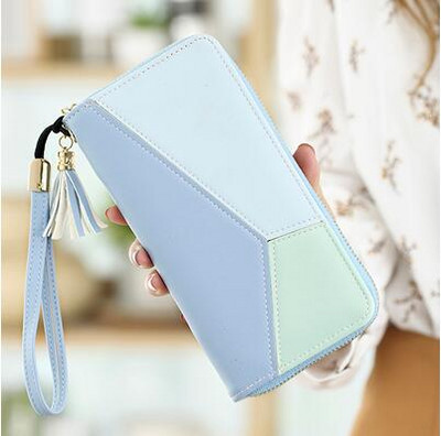 Πολυλειτουργικό γυναικείο πορτοφόλι κατασκευασμένο από έκο δέρμα με φούντα