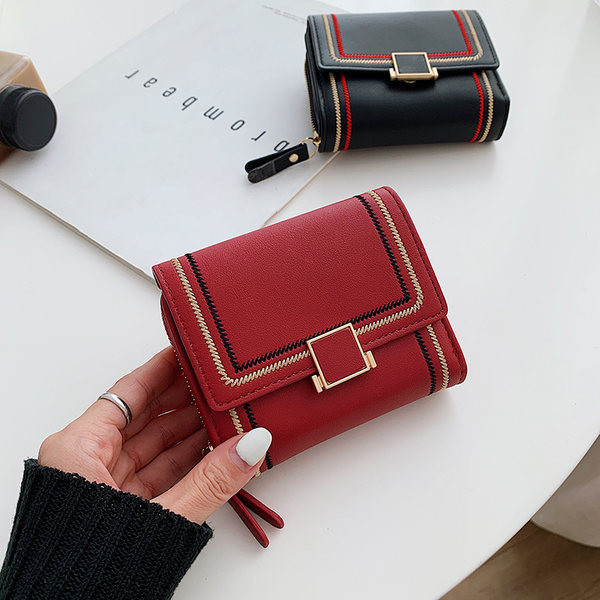 Γυναικείο έο δερμάτινο πορτοφόλι με μεταλλική στερέωση