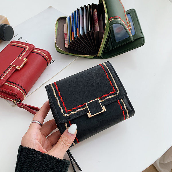 Γυναικείο έο δερμάτινο πορτοφόλι με μεταλλική στερέωση