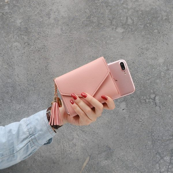 Γυναικείο έκο δερμάτινο πορτοφόλι με μενταγιόν και μεταλλικό κούμπωμα