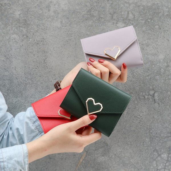 Moderns sieviešu salokāms maks ar metāla aizdari