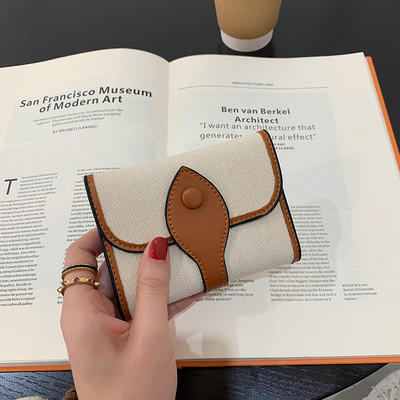 Γυναικείο πορτοφόλι με μεταλλική στερέωση - δύο μοντέλα