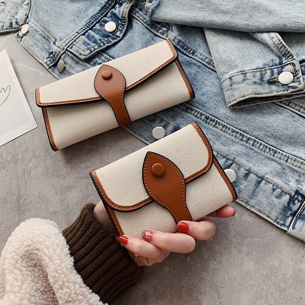 Γυναικείο πορτοφόλι με μεταλλική στερέωση - δύο μοντέλα