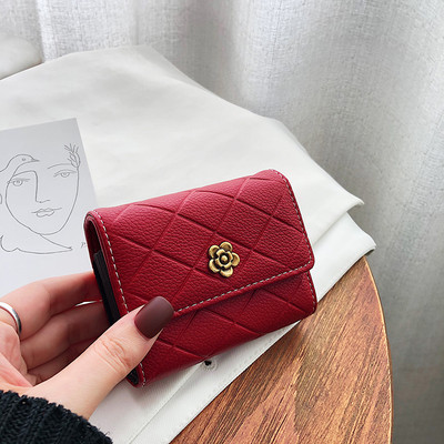 Γυναικείο έκο δερμάτινο πορτοφόλι με μεταλλικό λουλούδι