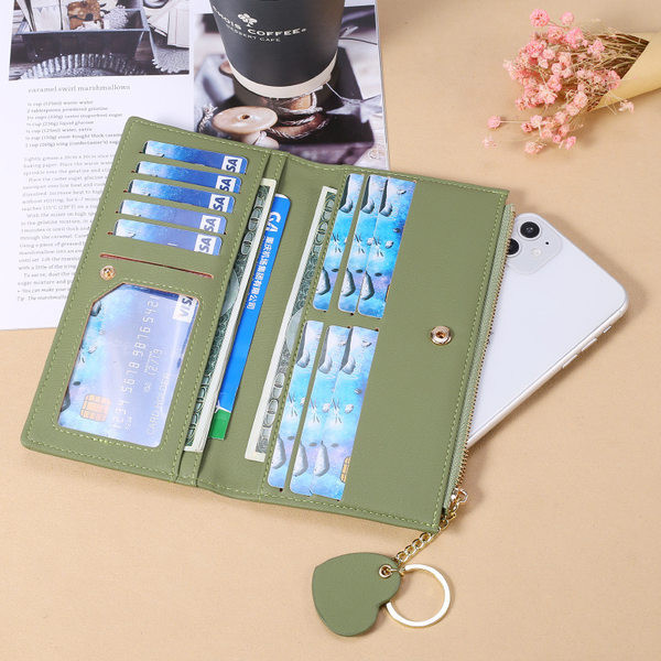 Sieviešu ādas maks ar lenti un metāla kulonu