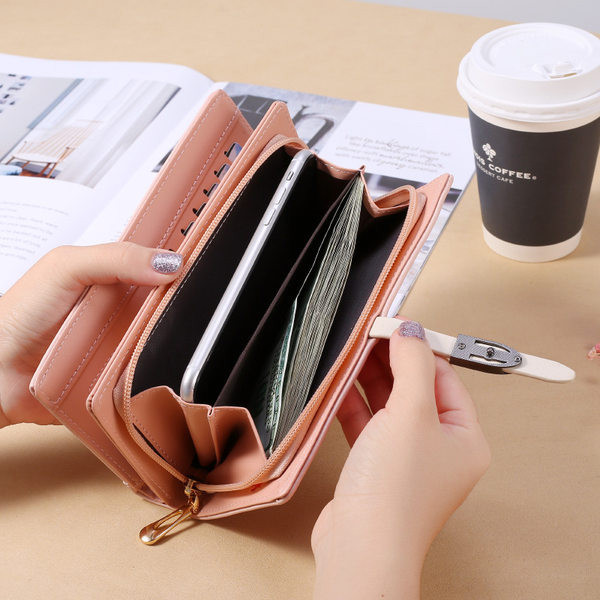 Γυναικείο πορτοφόλι μονόχρωμο  με μεταλλική στερέωση και φερμουάρ