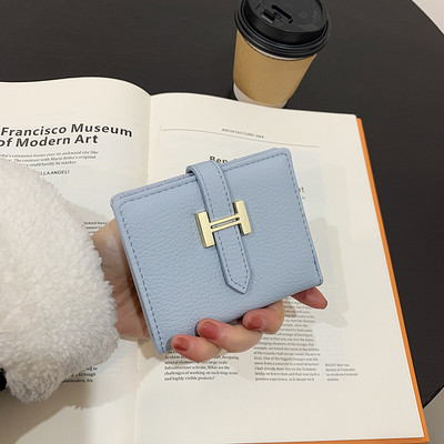 Γυναικείο έκο δερμάτινο πορτοφόλι με μεταλλικό στοιχείο