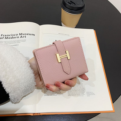 Γυναικείο έκο δερμάτινο πορτοφόλι με μεταλλικό στοιχείο