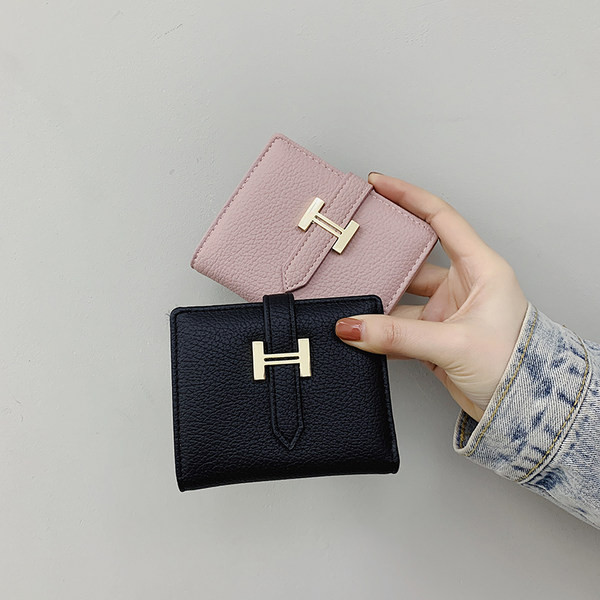 Γυναικείο έκο δερμάτινο πορτοφόλι με μεταλλικό στοιχείο