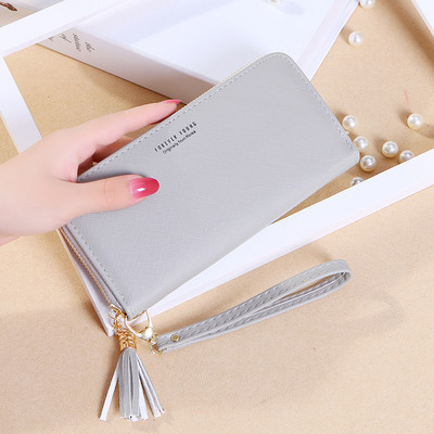 Sieviešu ādas maks ar pušķu un rāvējslēdzēja aizdari