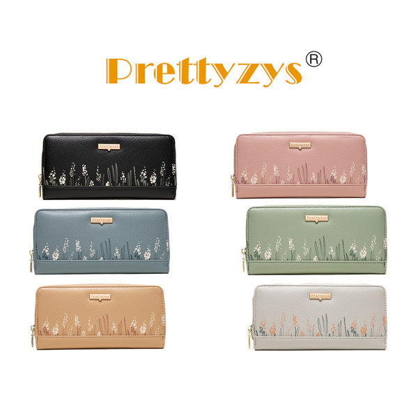 Καθημερινό γυναικείο πορτοφόλι με φερμουάρ και μεταλλική διακόσμηση