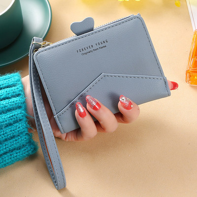 Γυναικείο μικρό πορτοφόλι με μεταλλική στερέωση - οικολογικό δέρμα