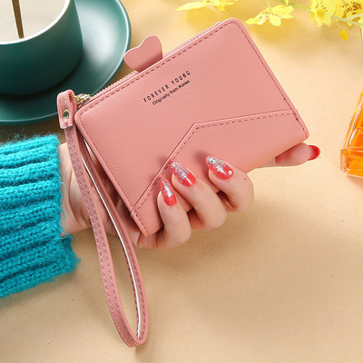 Γυναικείο μικρό πορτοφόλι με μεταλλική στερέωση - οικολογικό δέρμα