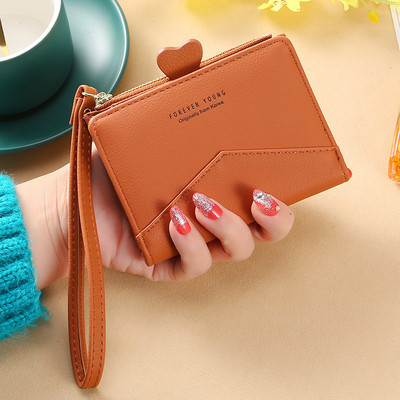 Γυναικείο μικρό πορτοφόλι με μεταλλική στερέωση - οικολογικό δέρμα