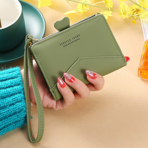 Γυναικείο μικρό πορτοφόλι με μεταλλική στερέωση - οικολογικό δέρμα